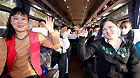 Chinese evacuees are seen in a bus to airport before flying back to China in Niigata, Japan, March 20, 2011.