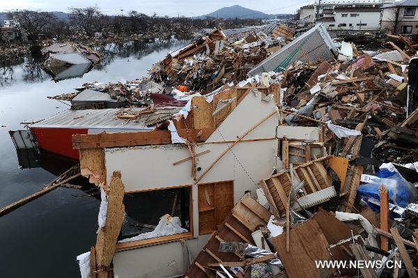 Photo taken on March 21, 2011, shows building debris in Kesennuma, Miyagi-ken in Japan. 