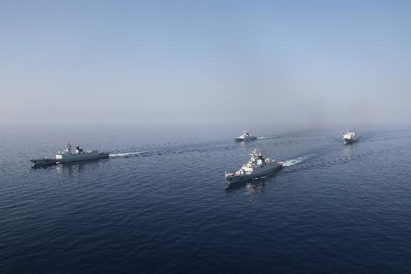 Chinese Navy's seventh batch of escort flotilla and eighth batch of escort flotilla travel during a ceremony for farewell navigation in Gulf of Aden, March 22, 2011.