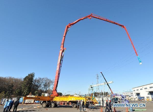 A Chinese-made pump truck recieves test in Chiba-ken, Japan, March 26, 2011. 