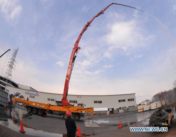 A Chinese-made pump truck recieves test in Chiba-ken, Japan, March 26, 2011.