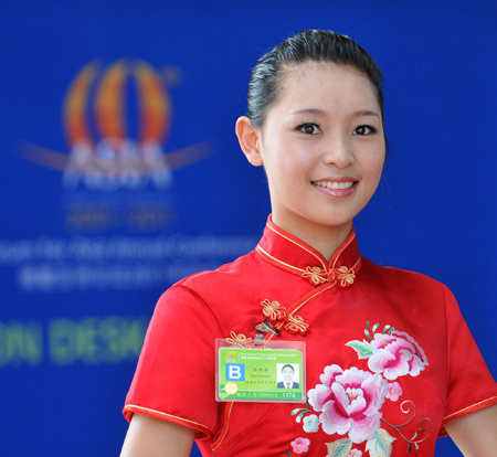 A guiding girl waits for the Boao Forum for Asia Annual Conference attendees at Sofitel Hotel in Boao, Hainan on April 13, 2011. The conference will be held from April 14 to 16. 