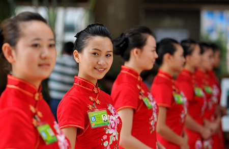 A guiding girl waits for the Boao Forum for Asia Annual Conference attendees at Sofitel Hotel in Boao, Hainan on April 13, 2011. The conference will be held from April 14 to 16.