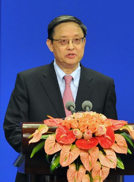 Zhou Wenzhong, secretary-general of the Boao Forum for Asia (BFA), presides over the opening ceremony of the 2011 annual meeting of the BFA in Boao, south China's Hainan Province, April 15, 2011.