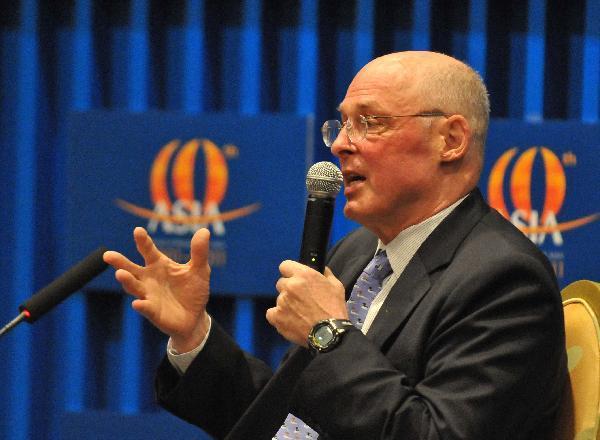 Henry Paulson, former US treasury secretary, has a dialogue with Zhou Wenzhong, secretary general of Boao Forum for Asia, during the 2011 annual meeting of the Boao Forum for Asia (BFA) in Boao, south China&apos;s Hainan Province, April 15, 2011.