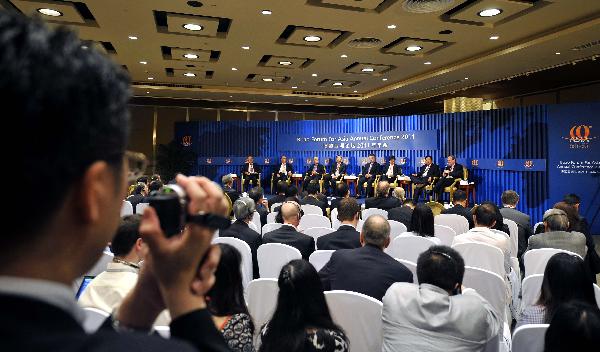 Delegates attend the forum 'Rediscover the Growth Potential of Japan' during the Boao Forum for Asia (BFA) Annual Conference 2011 in Boao, south China's Hainan Province, April 16, 2011.