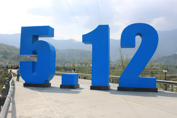 A 'May 12' monument in memory of the massive 8.0 magnitude earthquake that struck Sichuan on May 12, 2008 is seen in Pengzhou, southwest China's Sichuan Province, April 23, 2011.