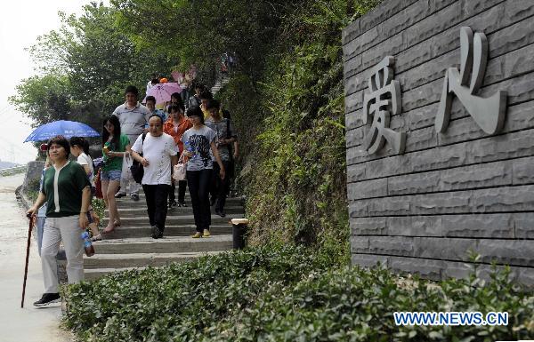 People visit the rebuilt Yingxiu Town of southwest China's Sichuan Province on April 30, 2011.
