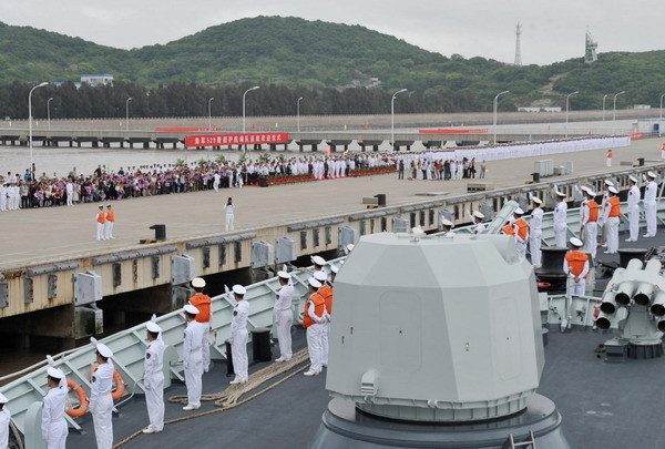 Frigate Zhoushan is seen approaching the berth prior to the welcome ceremony for the return of Chinese Navy Seventh Escort Task Force in Zhoushan, east China&apos;s Zhejiang Province, May 9, 2011.