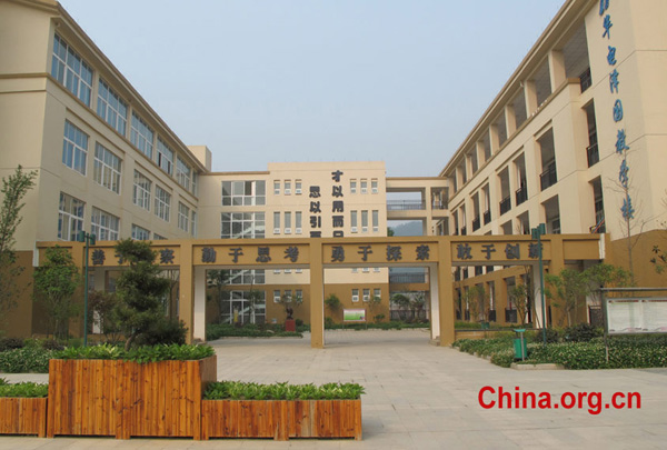 New buildings are seen in Bailu Primary School in Pengzhou City, southwest China&apos;s Sichuan Province, in 2011. 