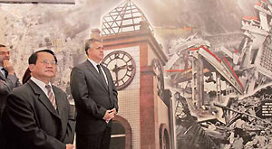 Foreign diplomats and other representatives visit an exhibition on Monday about reconstruction efforts following the devastating Wenchuan earthquake that hit Sichuan Province in May 2008.