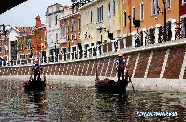 Two gondolas are seen at Tianjin Florence Town Outlets in Wuqing District of north China's Tianjin Municipality, June 9, 2011.