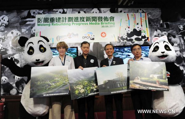 Photo taken on June 30, 2011 shows a press conference for Giant Panda Disease Control Center in Hong Kong, south China, June 30, 2011. 