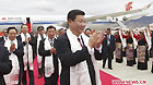 Chinese Vice President Xi Jinping (Front) is welcomed upon his arrival in Lhasa, capital of southwest China's Tibet Autonomous Region, on July 17, 2011.