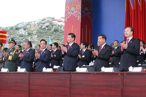 Chinese Vice President Xi Jinping (3rd R Front) attends the celebration conference marking the 60th anniversary of the peaceful liberation of Tibet, in Lhasa, capital of southwest China's Tibet Autonomous Region, July 19, 2011.