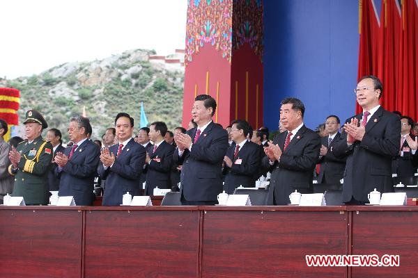 Chinese Vice President Xi Jinping (3rd R Front) attends the celebration conference marking the 60th anniversary of the peaceful liberation of Tibet, in Lhasa, capital of southwest China's Tibet Autonomous Region, July 19, 2011. 