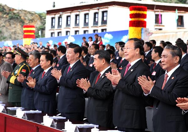Chinese Vice President Xi Jinping (4th R Front) attends the celebration conference marking the 60th anniversary of the peaceful liberation of Tibet, in Lhasa, capital of southwest China's Tibet Autonomous Region, July 19, 2011.