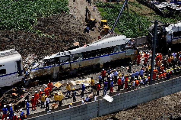 Aerial photo taken on July 24, 2011 shows the accident scene where rescuers clear the wreckage in Wenzhou, east China's Zhejiang Province, after a train collision and derailment that killed at least 35 and injured more than 200 Saturday night. 