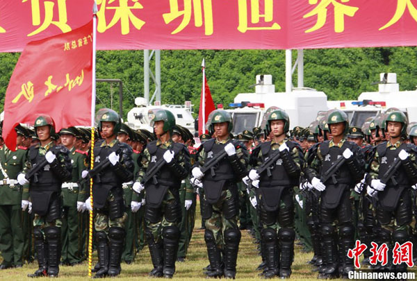 The PAPC (Chinese People&apos;s Armed Police Corps) safety guard oath-taking rally for the 26th World University Games was held in Shenzhen, southeast China&apos;s Guangdong Province July 31, 2011. 