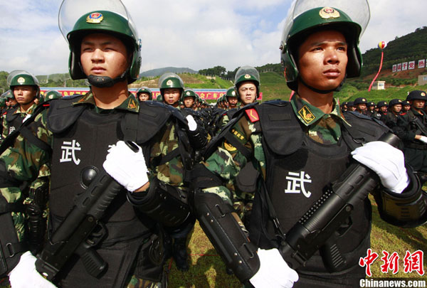 The PAPC (Chinese People&apos;s Armed Police Corps) safety guard oath-taking rally for the 26th World University Games was held in Shenzhen, southeast China&apos;s Guangdong Province July 31, 2011. 