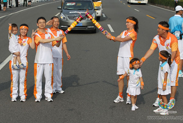 Two families participate the Torch Relay as the creative idea of the 26th Universiade ,Shenzhen,China, August 7,2011.