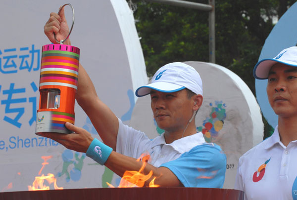 There are about 267 torchbearers and 211 legs with 14 miles for the Torch Relay of the 26th Universiade, Shenzhen, China, August 7, 2011.