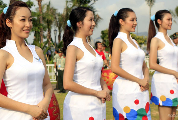 There are many beautiful etiquette volunteers during Torch Relay of the 26th Universiade, Shenzhen, China,August 7,2011.