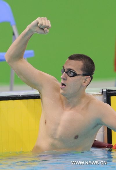 Laszlo Cseh of Hungary celebrates after finishing the men's 400m individual medley of swimming at the 26th Summer Universiade in Shenzhen, a city of south China's Guangdong Province, Aug. 18, 2011. 