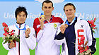 Gold medalist Laszlo Cseh of Hungary (C), silver medalist Yuya Horihata of Jpan (L), and bronze medalist William Harris of the United States display their medals on the podium during the awarding cermony of men's 400 individual medley final at the 26th Summer Universiade in Shenzhen, a city of south China's Guangdong Province, Aug. 18, 2011.
