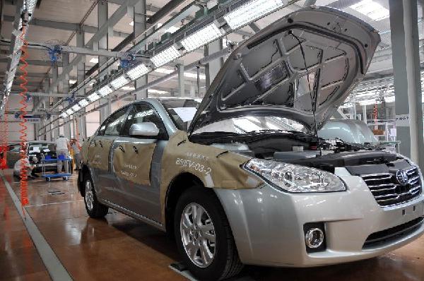 Photo taken on Aug. 22, 2011 shows the assemble lines of new energy cars in a workshop of China FAW New Energy Vehicle Branch in Changchun, capital of northeast China's Jilin Province.