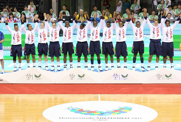The team members of the United States greet the spectators during the awarding ceremony of the women&apos;s basketball event at the 26th Summer Universiade in Shenzhen, a city of south China&apos;s Guangdong Province, on Aug. 21, 2011. 
