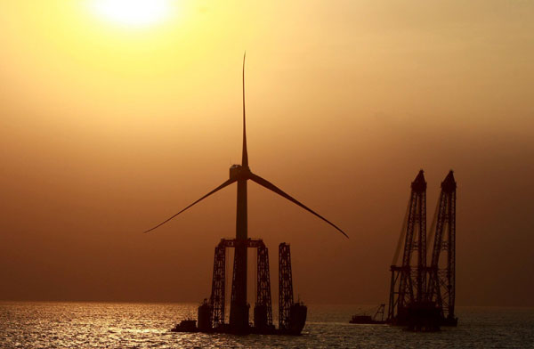 A new wind turbine generator is under construction at Shanghai Donghai Bridge Offshore Wind Farm on Sept 5, 2011.
