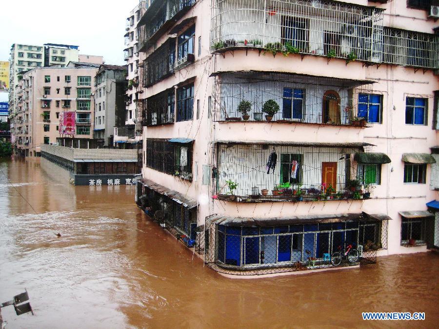 Buildings are inundated in floodwaters in Quxian County, southwest China&apos;s Sichuan Province, Sept. 19, 2011.