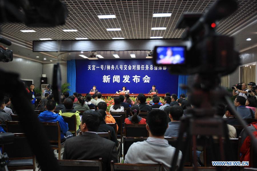 A news conference on the nation&apos;s first space-docking procedure is held at the Jiuquan Satellite Launch Center in northwest China&apos;s Gansu Province, Sept. 28, 2011. 