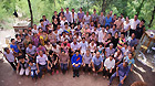 The file photo taken on Aug. 20, 2011 shows centenarian Zhang Dengke (C, first row) taking a group photo with her entire family in Zigui County of central China's Hubei Province.