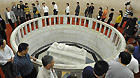 People pay respect to the sculpture of Dr. Sun Yat-Sen, at the mausoleum of Dr. Sun Yat-sen in Nanjing, capital of east China's Jiangsu Province, Oct. 10, 2011.