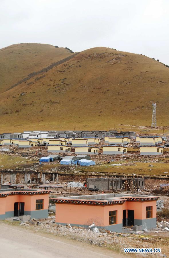 Photo taken on Sept. 30, 2011 shows rebuilt housing area for farmers and herdsmen in Yushu, northwest China&apos;s Qinghai Province.