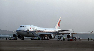 A boeing 747-400 plane using mixed fuel of biofuel and traditional aviation kerosene taxies before the test flight in Beijing, capital of China, Oct. 28, 2011.