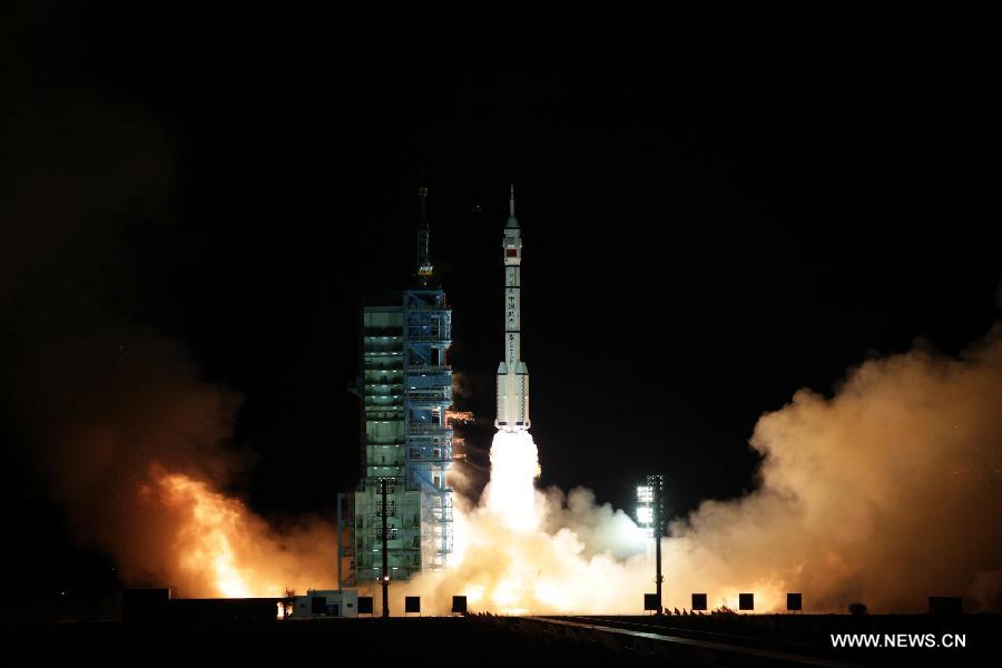 A modified model of the Long March CZ-2F rocket carrying the unmanned spacecraft Shenzhou-8 blasts off from the launch pad at the Jiuquan Satellite Launch Center in northwest China's Gansu Province, Nov. 1, 2011.