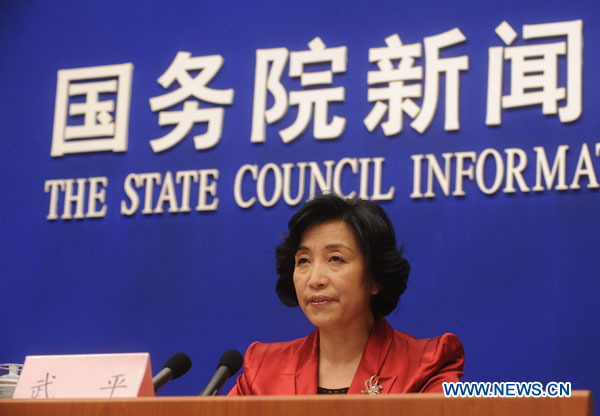 Wu Ping, spokeswoman for China's manned space program, speaks during a press conference about the first docking of China's unmanned spacecraft Shenzhou-8 and its space lab module Tiangong-1, in Beijing, capital of China, Nov. 3, 2011.