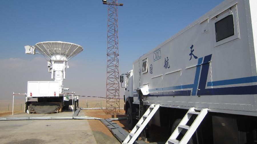 Photo taken on Nov. 16, 2011 shows the radar station, ground surveillance station and weather station which have stated operation for the return of the Shenzhou 8 unmanned spacecraft in the main landing field in north China&apos;s Inner Mongolia Autonomous Region. 