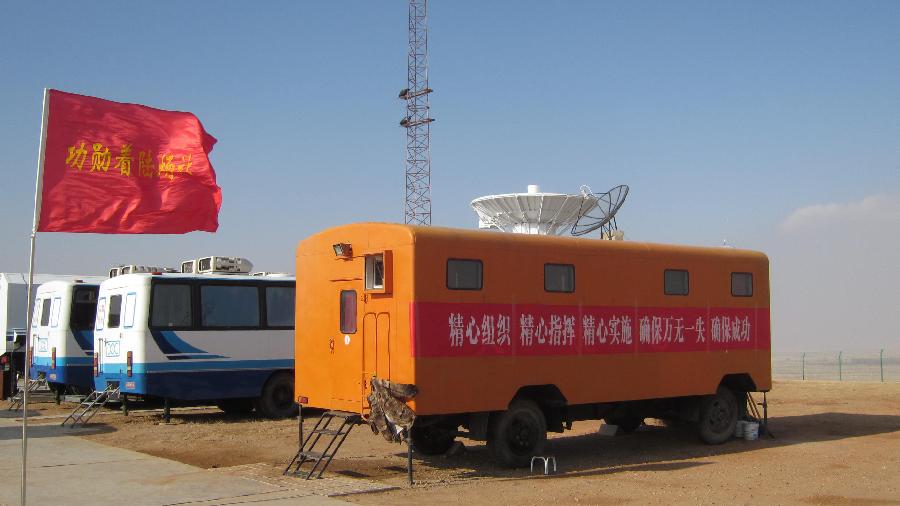 Photo taken on Nov. 16, 2011 shows the radar station, ground surveillance station and weather station which have stated operation for the return of the Shenzhou 8 unmanned spacecraft in the main landing field in north China&apos;s Inner Mongolia Autonomous Region. 