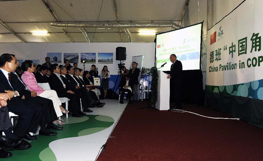 Xie Zhenhua , deputy director of the National Development and Reform Commission, addresses the launching ceremony of the Chinese Pavalion to the 17th Conference of Parties (COP17) to the UNFCCC in Durban, Soth Africa, Dec. 4, 2011. 