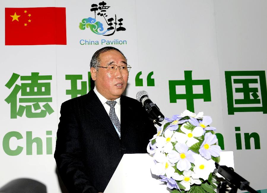 Xie Zhenhua , deputy director of the National Development and Reform Commission, addresses the launching ceremony of the Chinese Pavalion to the 17th Conference of Parties (COP17) to the UNFCCC in Durban, Soth Africa, Dec. 4, 2011. 