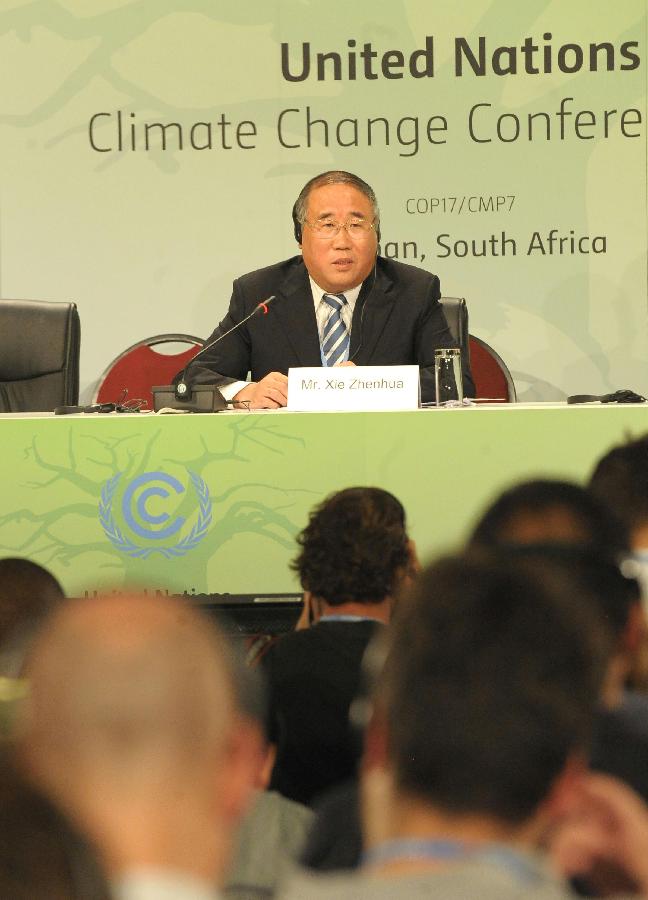Xie Zhenhua, deputy director of the National Development and Reform Commission and head of the Chinese delegation, addresses a news conference in Durban, South Africa, on Dec. 5, 2011. 
