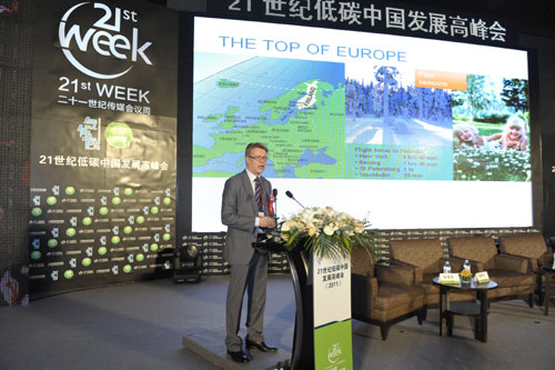 Mikko Puustinen, Press and Cultural Counselor at the Embassy of Finland in China makes a speech at the 21st Century China Low-carbon Development Summit in Beijing on December 6, 2011.