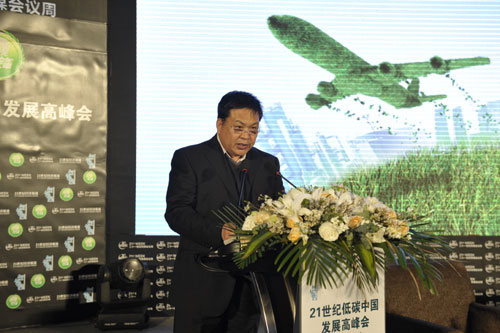 Zhang Xinping, deputy director of the Institute for Urban and Environmental Studies under the Chinese Academy of Social Sciences makes a speech at the 21st Century China Low-carbon Development Summit in Beijing on December 6, 2011. 