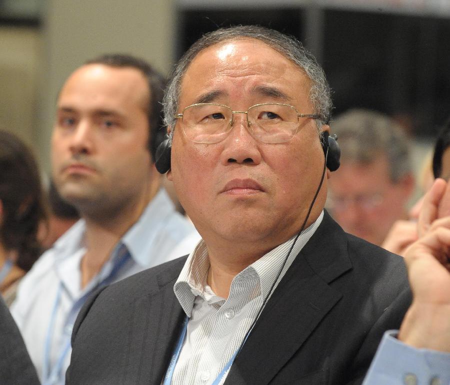Xie Zhenhua, vice director of China&apos;s National Development and Reform Commission and head of the Chinese delegation, attends the plenary session of the UN Climate Conference (COP17) in Durban, South Africa, Dec. 11, 2011. 