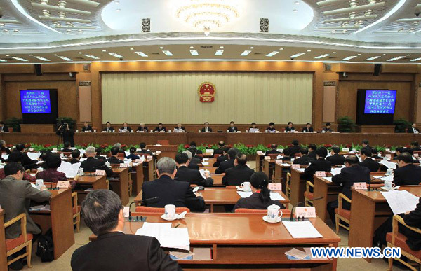 Representatives attend the closing meeting of the 25th session of the 11th China's National People's Congress (NPC) Standing Committee in Beijing, capital of China, Feb. 29, 2012. 