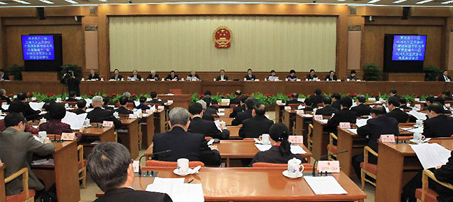Representatives attend the closing meeting of the 25th session of the 11th China's National People's Congress (NPC) Standing Committee in Beijing, capital of China, Feb. 29, 2012.